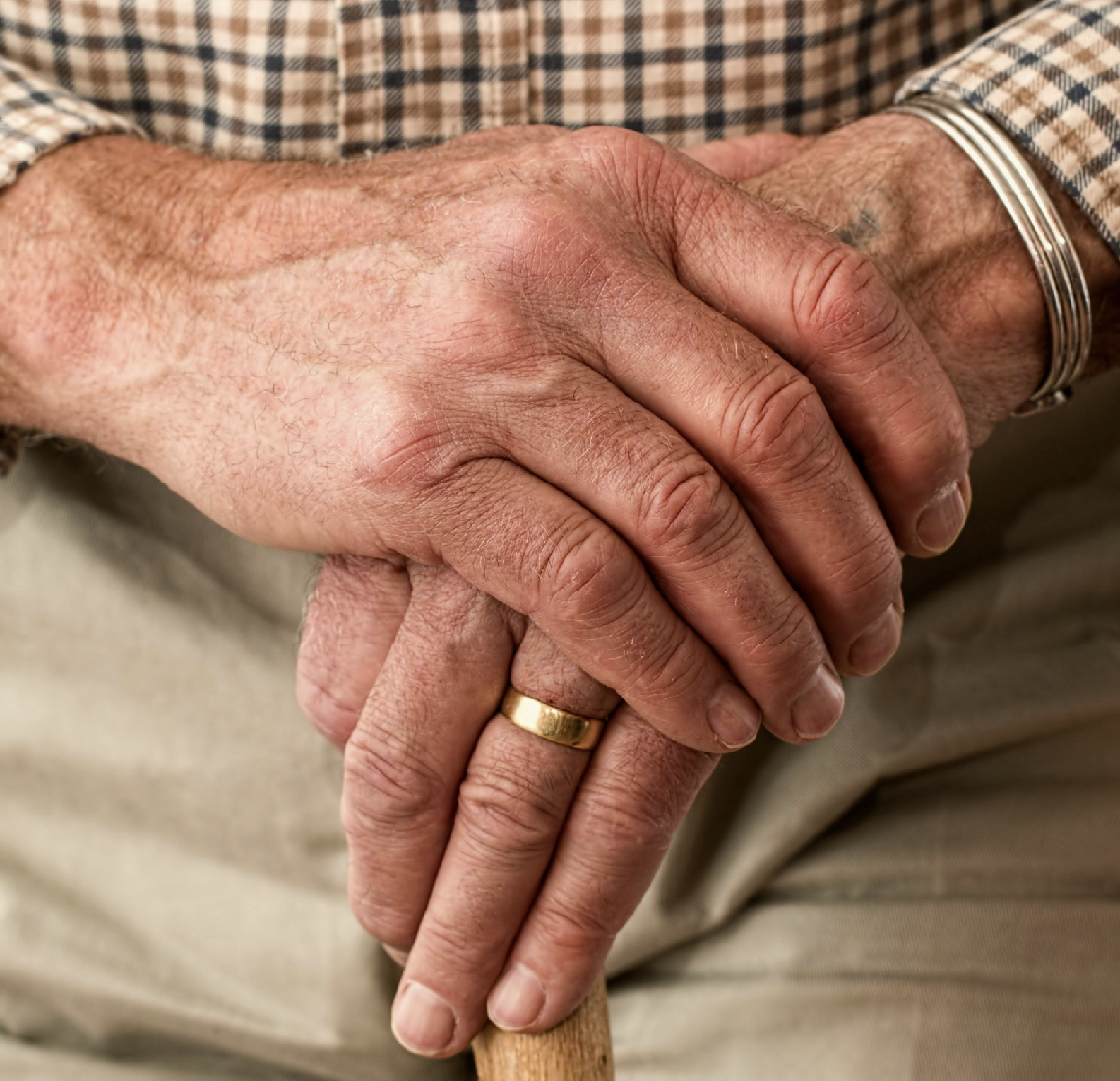 Imaging depicting older person's hands to represent frailty associated with low creatine levels